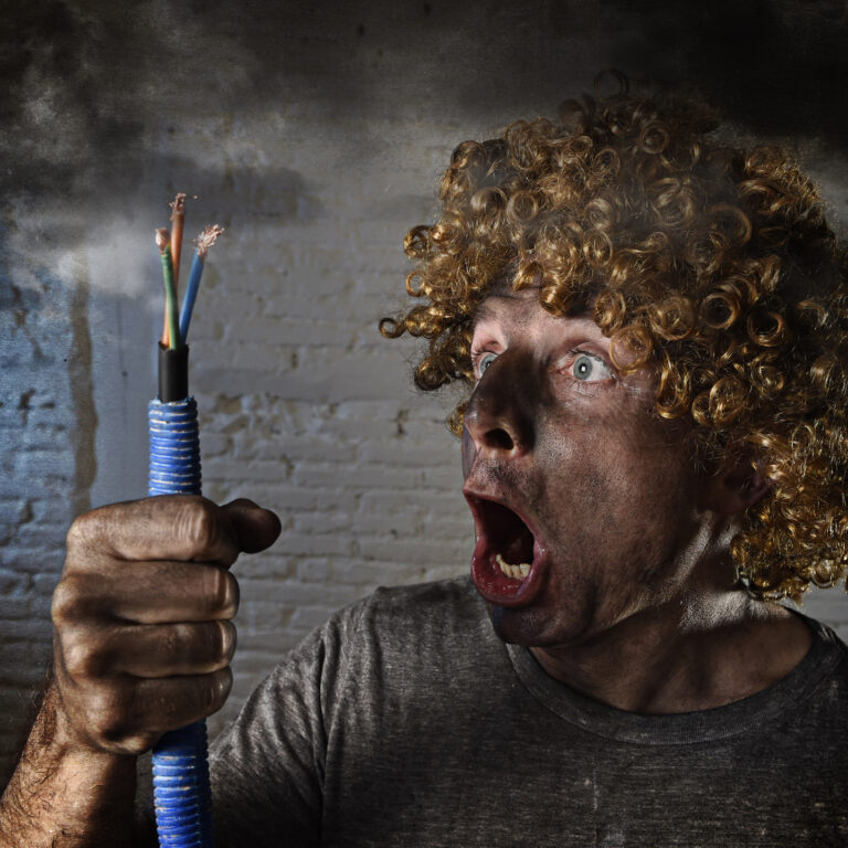 man with cable smoking after domestic accident with dirty burnt face shock electrocuted expression DIY Business sale can cost you big